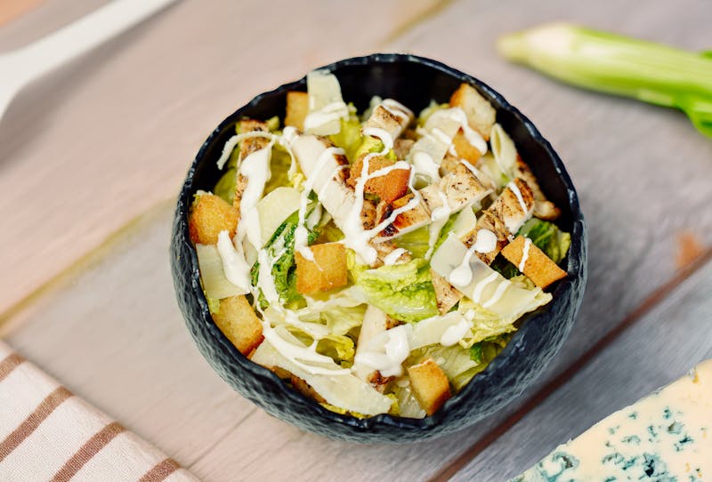 Classic Caesar salad with romaine, croutons, and parmesan