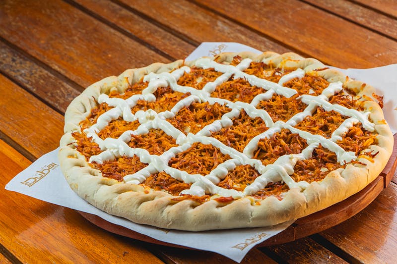 Cowboy Meat Lover pizza loaded with pepperoni, sausage, and bacon